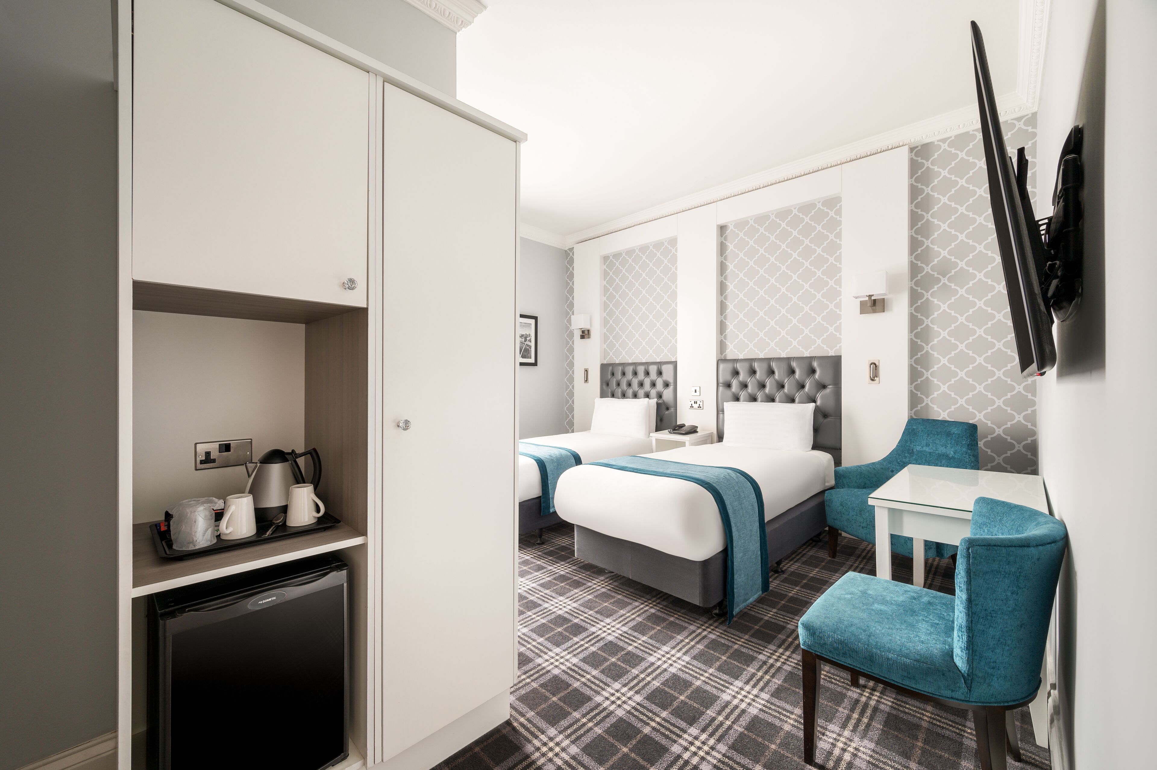 carlton classic twin room (separate building) | desk, laptop workspace, iron/ironing board, free wifi