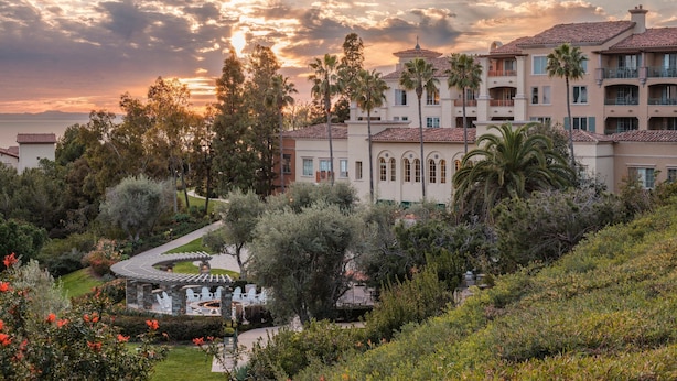 A resort with multiple-story buildings, a landscaped garden, and a pool area. - Marriott's Newport Coast Villas (Newport Beach)