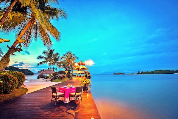 Breakfast, lunch, dinner served; beach views