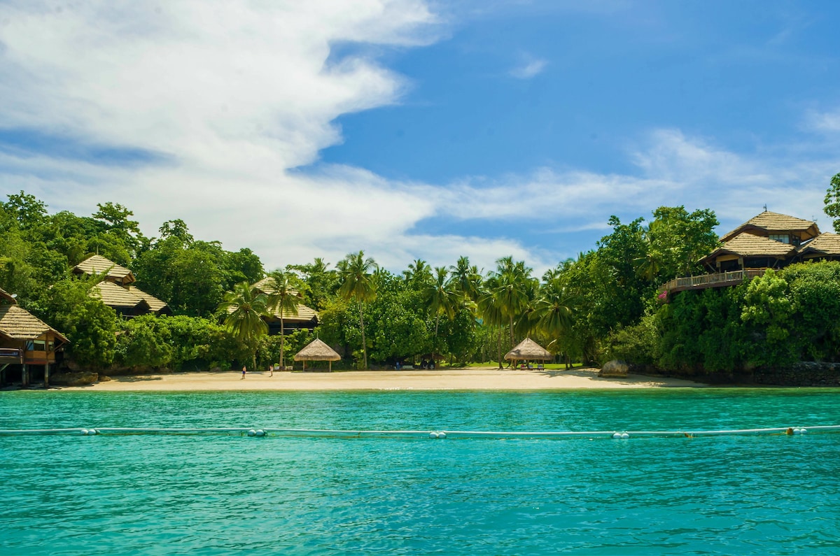 On the beach, white sand, free beach cabanas, sun-loungers