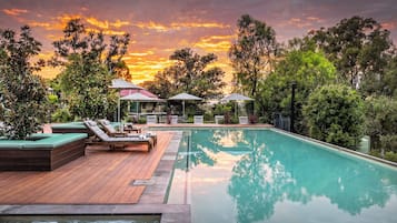 2 outdoor pools, pool umbrellas, pool loungers