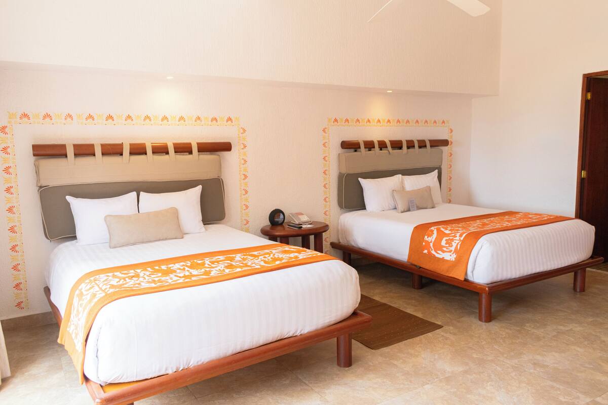 Brisas Beach Club Deluxe Queen | Bathroom | Shower, hair dryer, towels