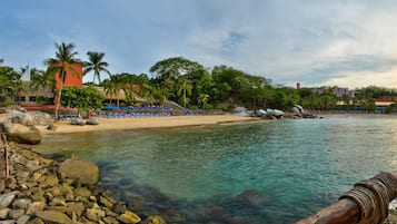 On the beach, snorkeling, windsurfing, beach bar