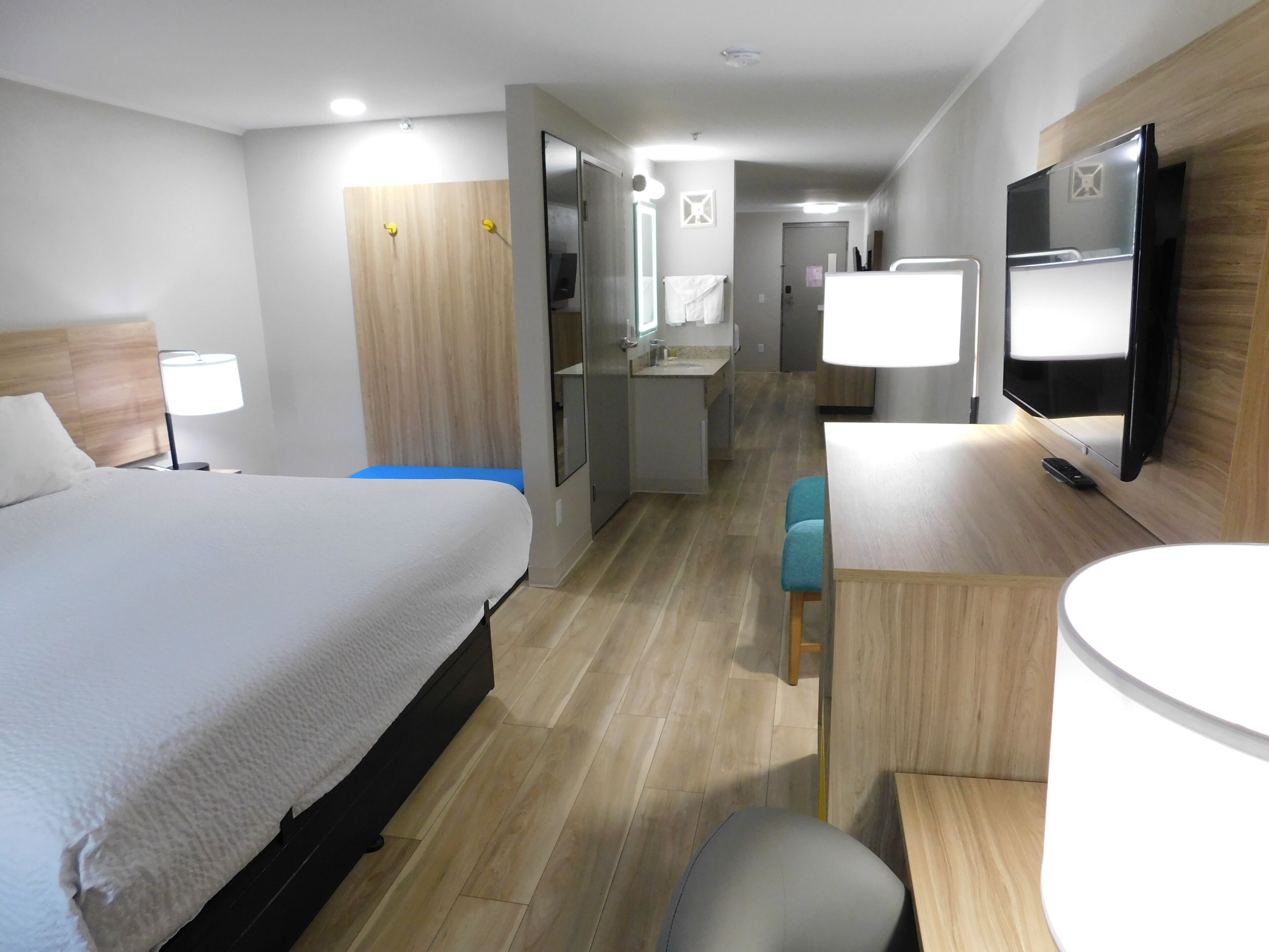 Suite, 1 Bedroom, Non Smoking (1 King Bed and 1 Queen Bed) | In-room safe, desk, blackout drapes, iron/ironing board