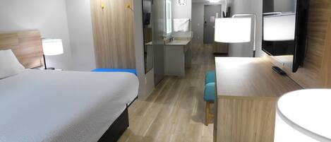Suite, 1 Bedroom, Non Smoking (1 King Bed and 1 Queen Bed) | In-room safe, desk, blackout curtains, iron/ironing board