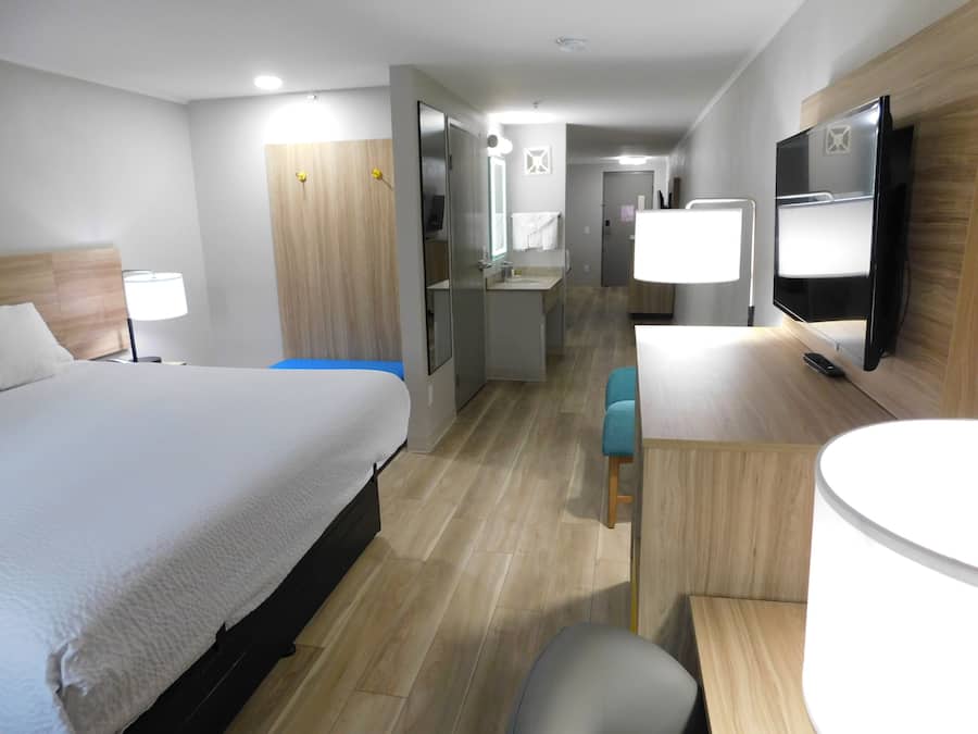 Suite, 1 Bedroom, Non Smoking (1 King Bed and 1 Queen Bed) | In-room safe, desk, blackout curtains, iron/ironing board