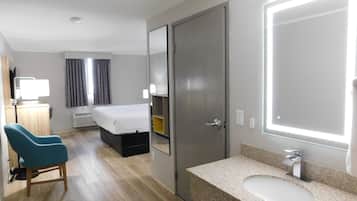 Suite, 1 Bedroom, Non Smoking (1 King Bed and 1 Queen Bed) | In-room safe, desk, blackout drapes, iron/ironing board