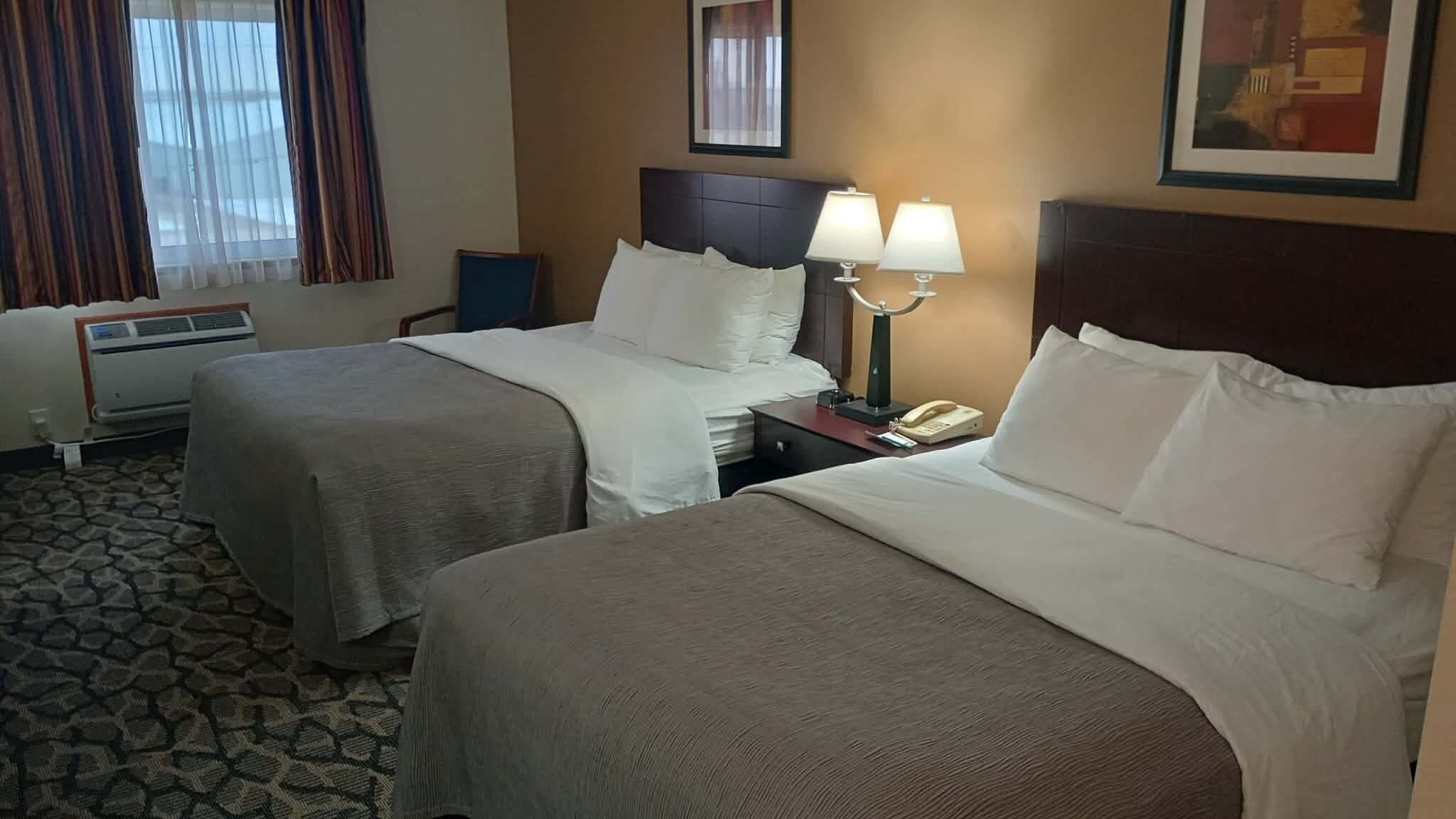 Double Room, 2 Queen Beds, Non Smoking | Premium bedding, pillowtop beds, in-room safe, desk