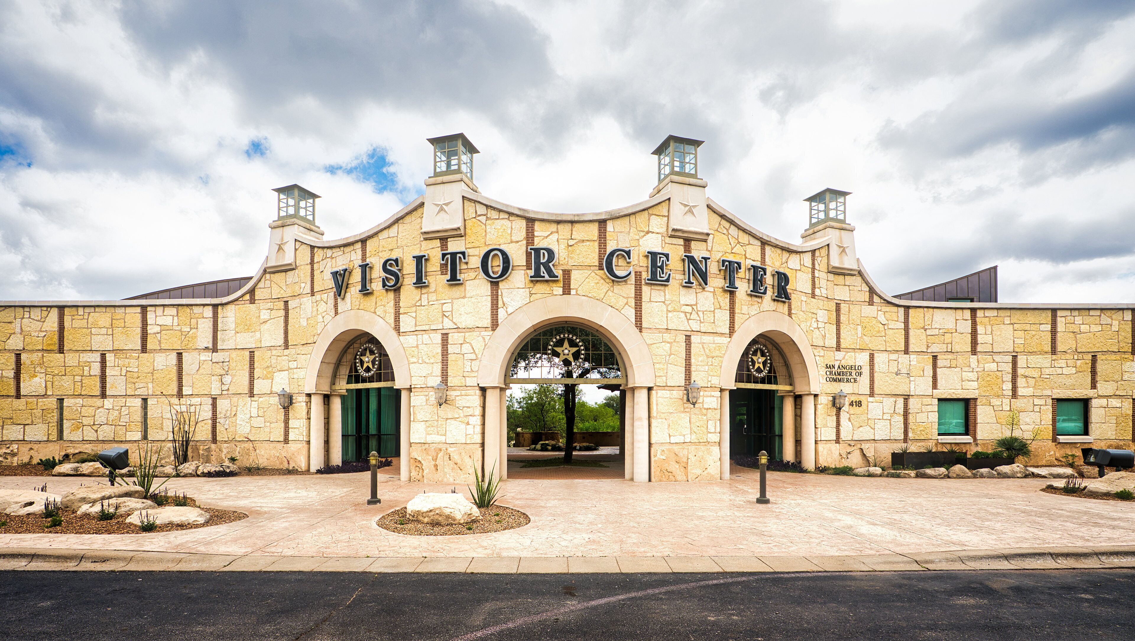 A stone building with the words "VISITOR CENTER" above the entrance.