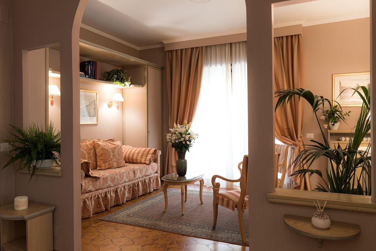Standard Apartment | Living room | 80-cm plasma TV with satellite channels, TV, pay films