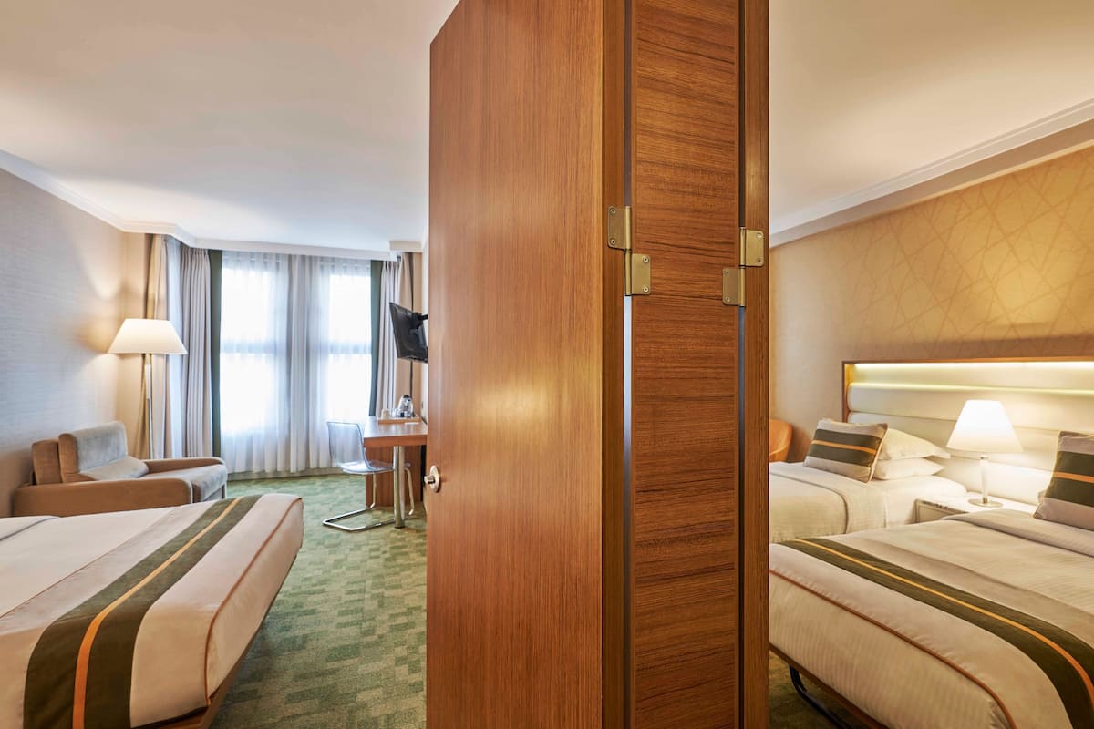 Connecting Family Room | Minibar, in-room safe, desk, laptop workspace