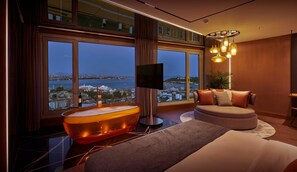 Amber Suite | Minibar, in-room safe, desk, laptop workspace