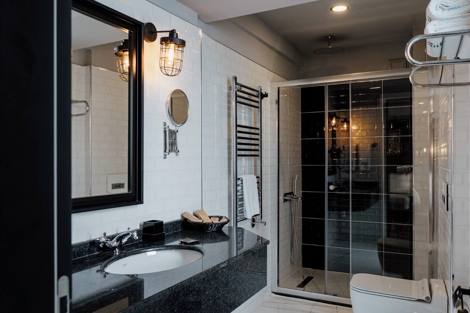 superior room | bathroom | designer toiletries, hair dryer, slippers, towels