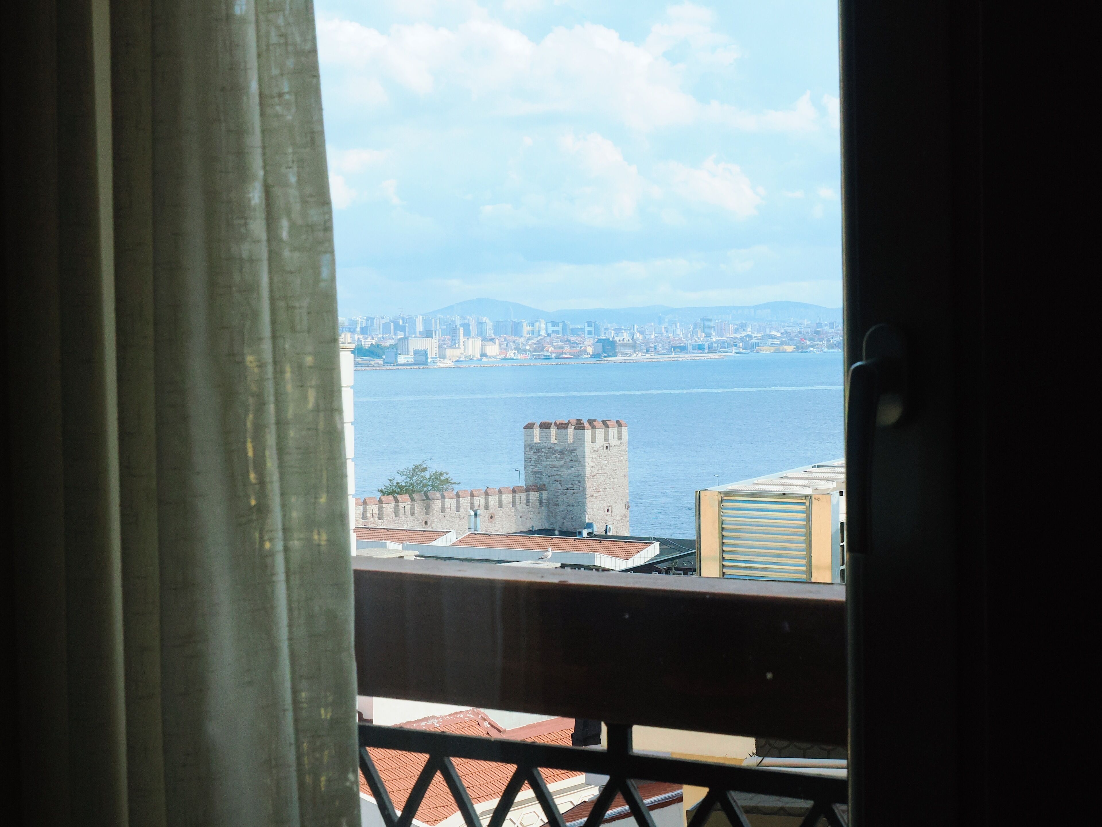 Superior Triple Room, Sea View | Minibar, in-room safe, desk, soundproofing
