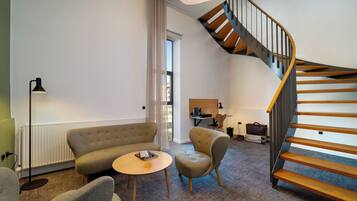 Suite, River View, Tower (Two Floors) | In-room safe, desk, iron/ironing board, free cribs/infant beds