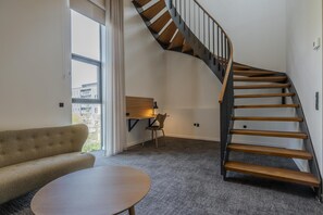 Suite, River View, Tower (Two Floors) | In-room safe, desk, iron/ironing board, free cots/infant beds