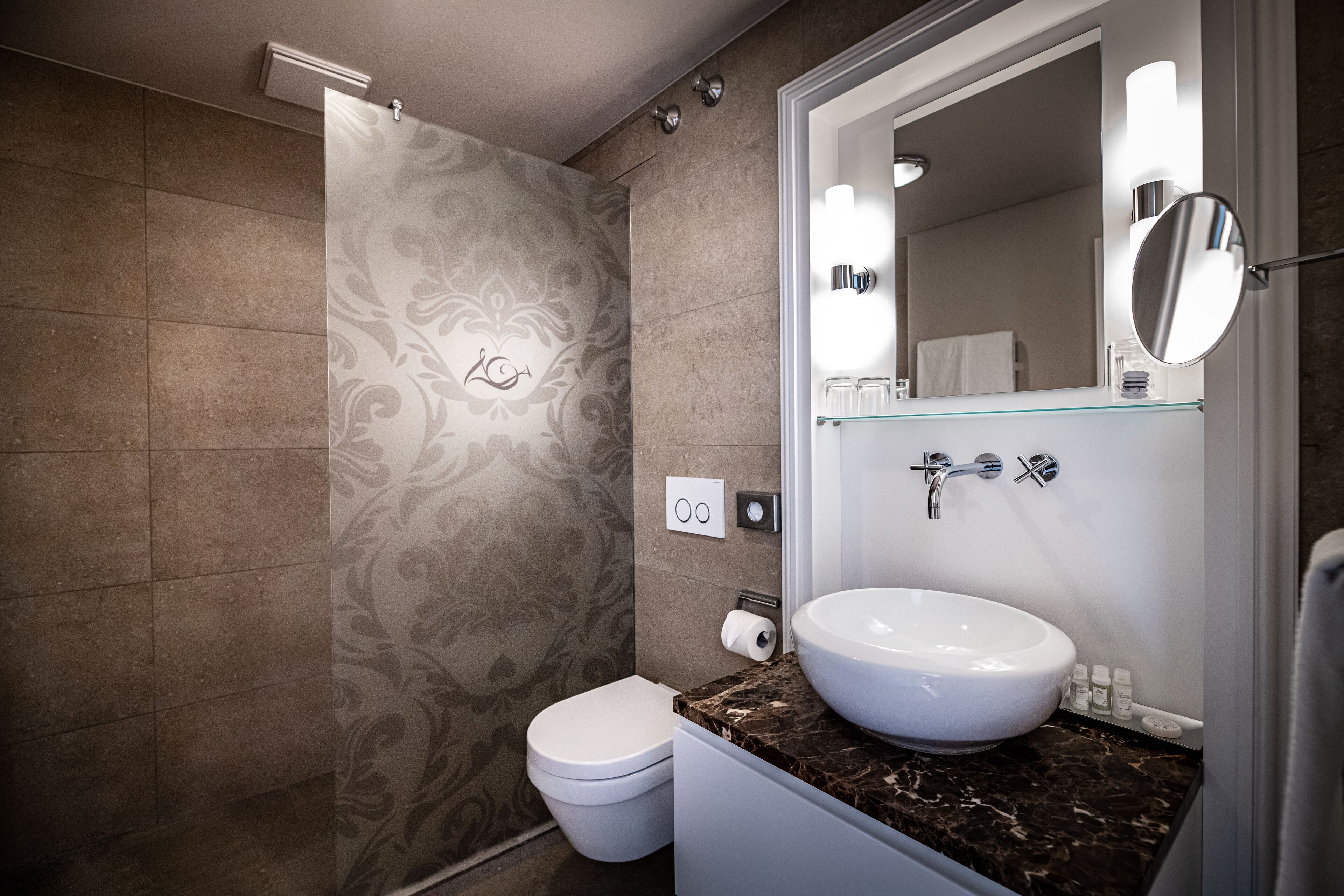 combined shower/bathtub, free toiletries, hair dryer, bathrobes