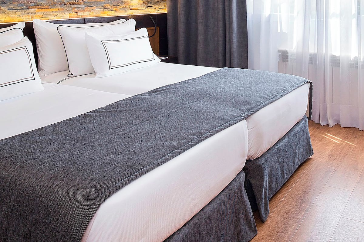 Down duvets, free minibar items, in-room safe, desk