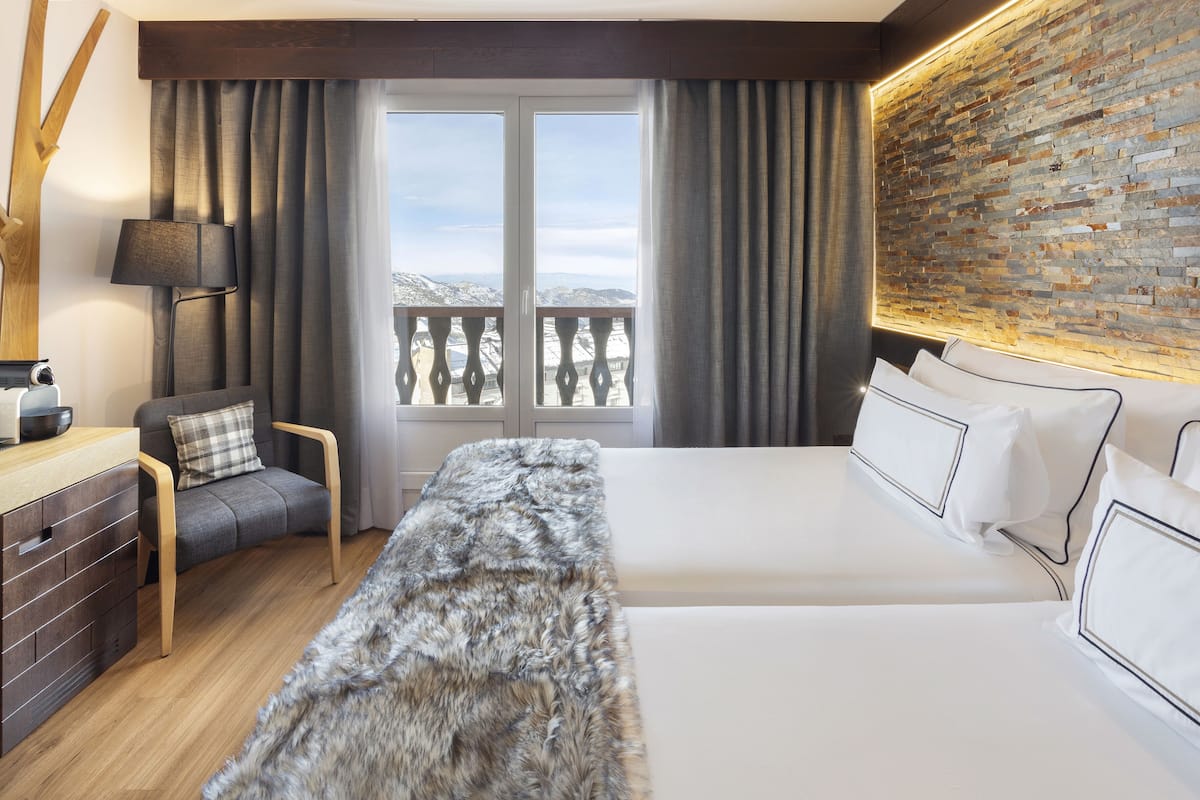 The Level Deluxe Mountain View | Down comforters, minibar, in-room safe, desk