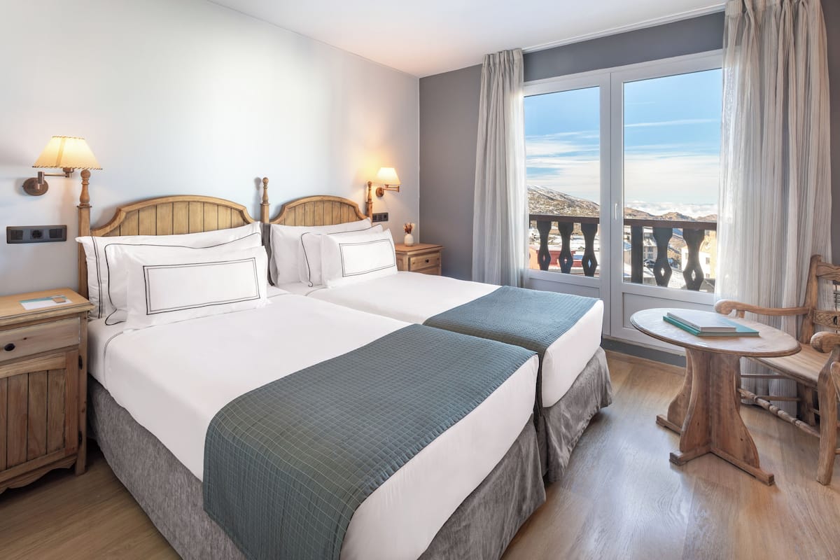 Down duvets, free minibar items, in-room safe, desk