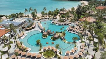 4 outdoor pools, open 7:00 AM to 7:00 PM, free cabanas, pool umbrellas