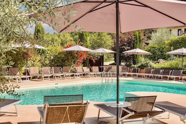 Outdoor pool, a rooftop pool, sun loungers