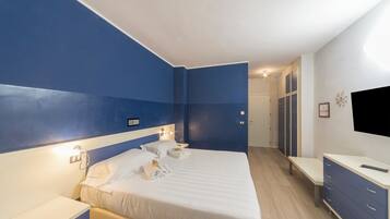 Family Quadruple Room, Private Bathroom | Premium bedding, in-room safe, desk, soundproofing