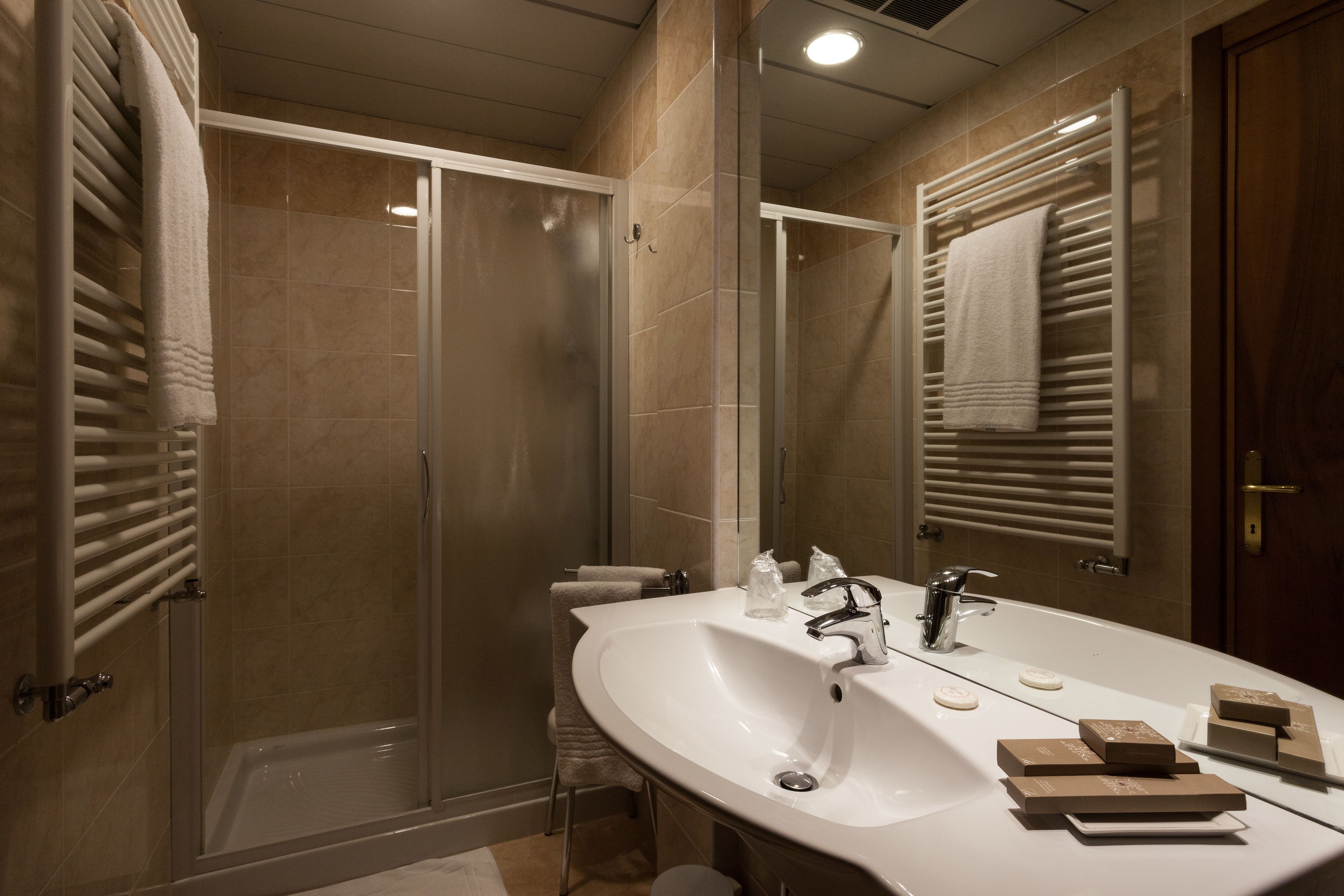 shower, free toiletries, hair dryer, slippers