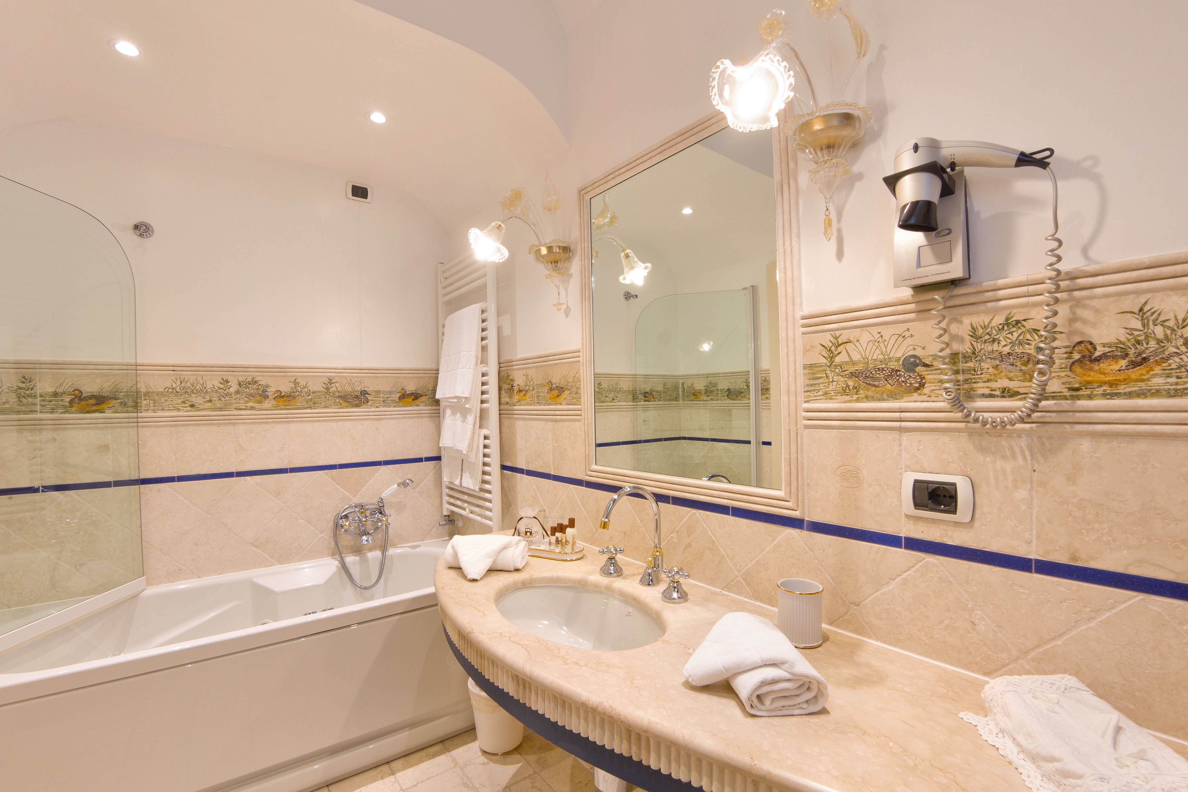 shower, free toiletries, hair dryer, slippers