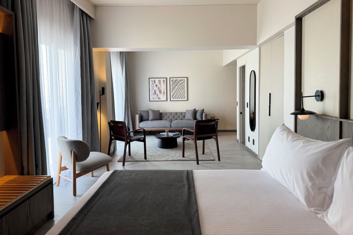 Superior Suite, Balcony, Sea View | Minibar, in-room safe, desk, blackout curtains