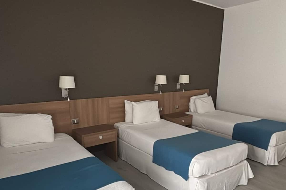 Family Room, Multiple Beds, City View | Minibar, in-room safe, desk, blackout drapes