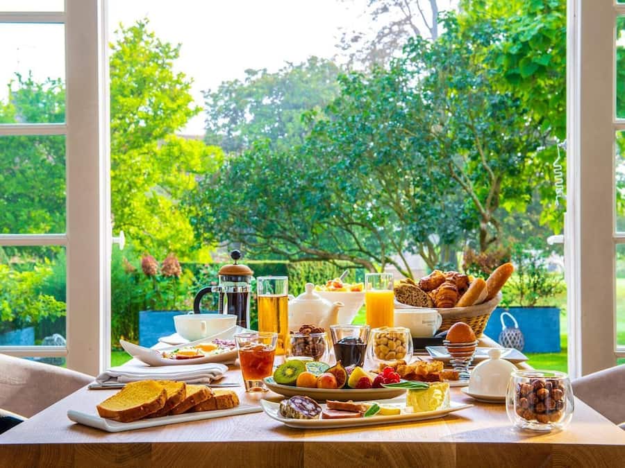 Lunch, dinner served; French cuisine, garden views