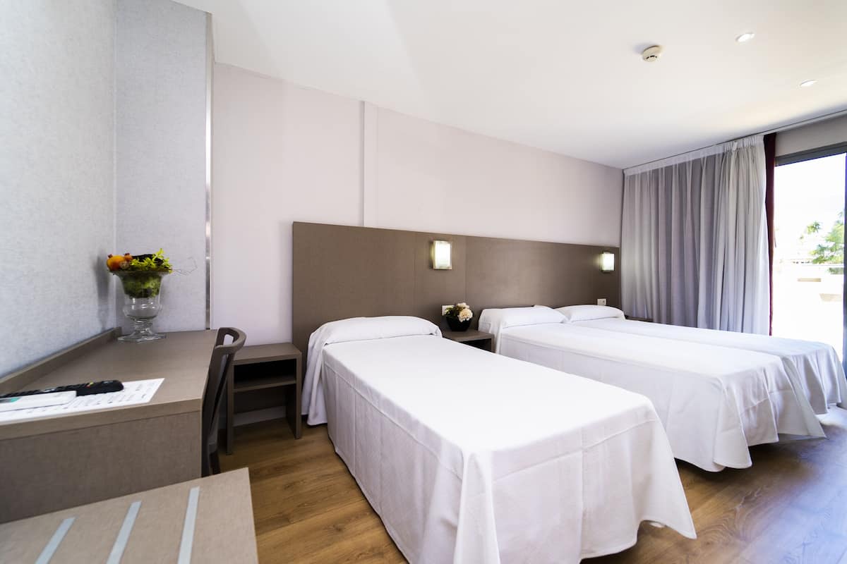 Triple Room, Terrace (3 Adults) | Blackout drapes, free WiFi, bed sheets, wheelchair access