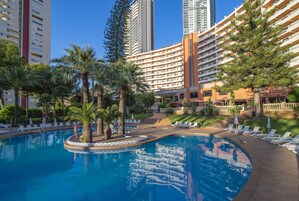 Indoor pool, seasonal outdoor pool, pool umbrellas, sun loungers