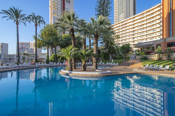 Indoor pool, seasonal outdoor pool, pool umbrellas, sun loungers