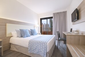Premium bedding, minibar, desk, laptop workspace
