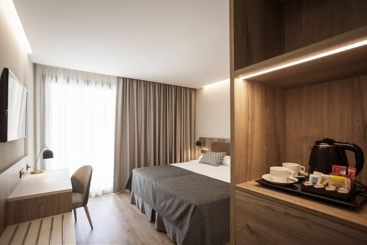 Minibar, desk, laptop workspace, blackout drapes