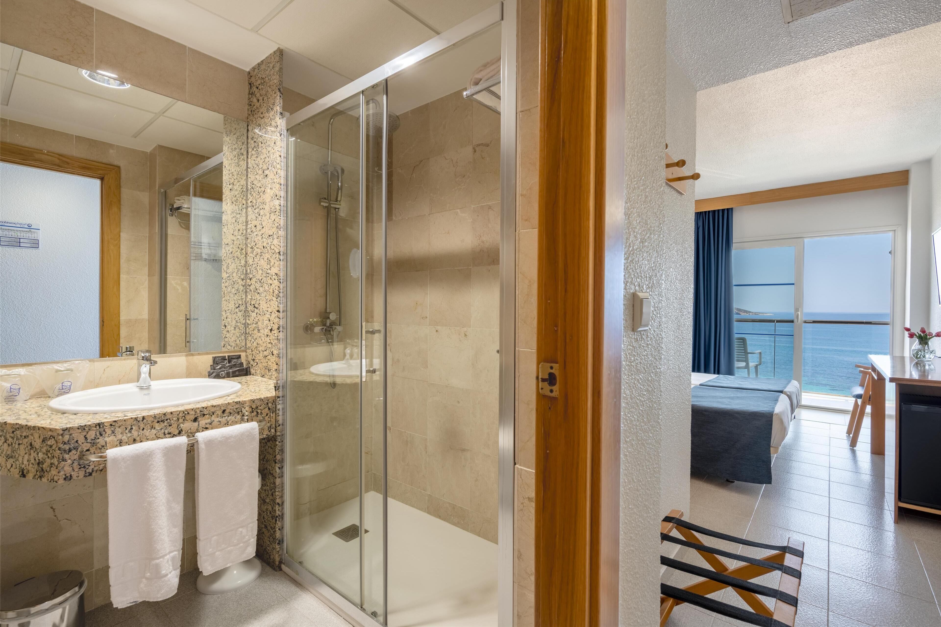 deep-soaking bathtub, free toiletries, hair dryer, towels