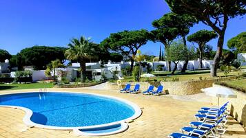 Outdoor pool, pool umbrellas, pool loungers