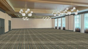 A large, empty conference room with patterned carpet, multiple chandeliers, and large windows. - Kimpton Marlowe Hotel by IHG (Cambridge)