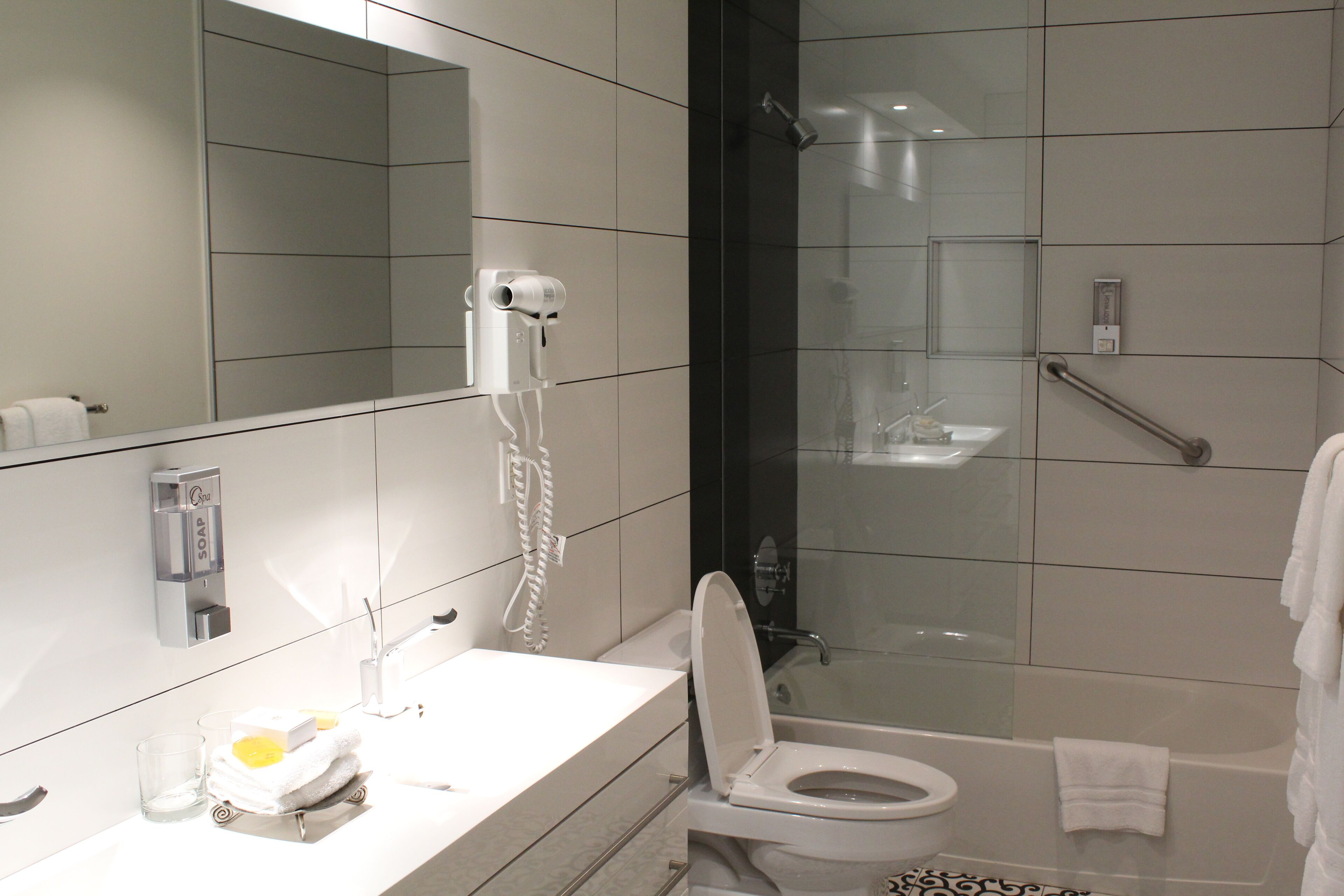 combined shower/bathtub, free toiletries, hair dryer, bathrobes