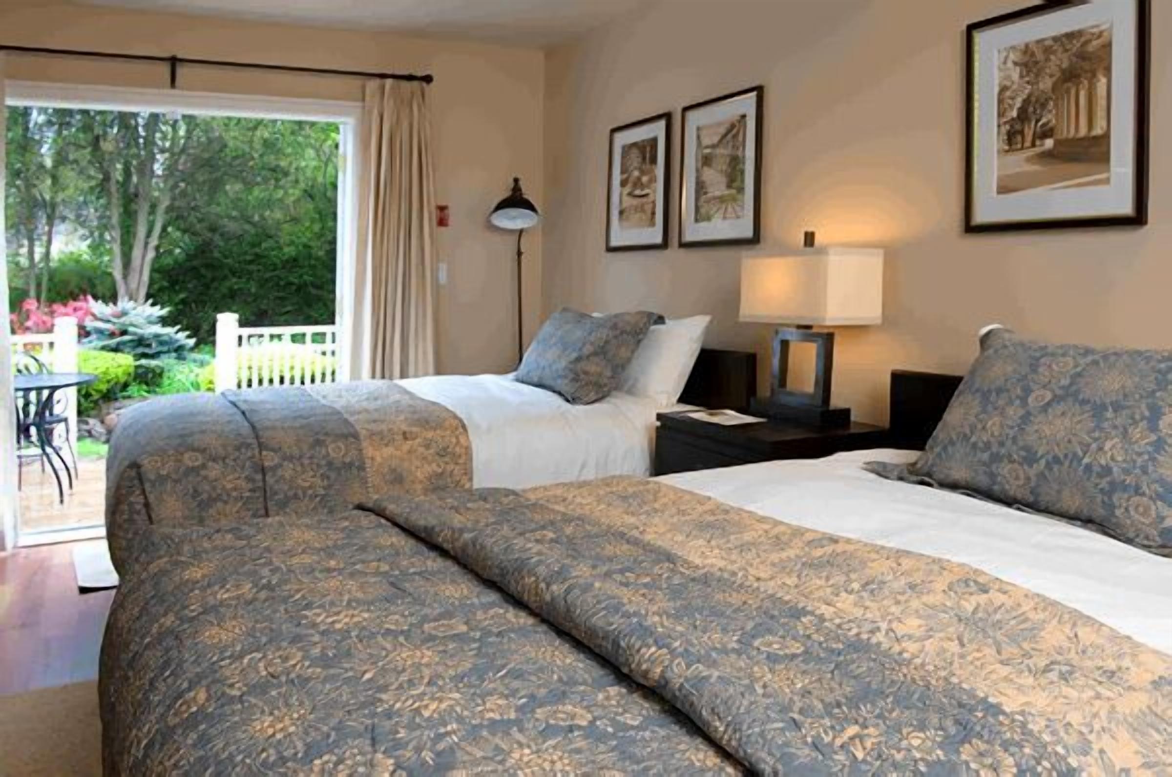 premium bedding, pillow-top beds, desk, laptop workspace