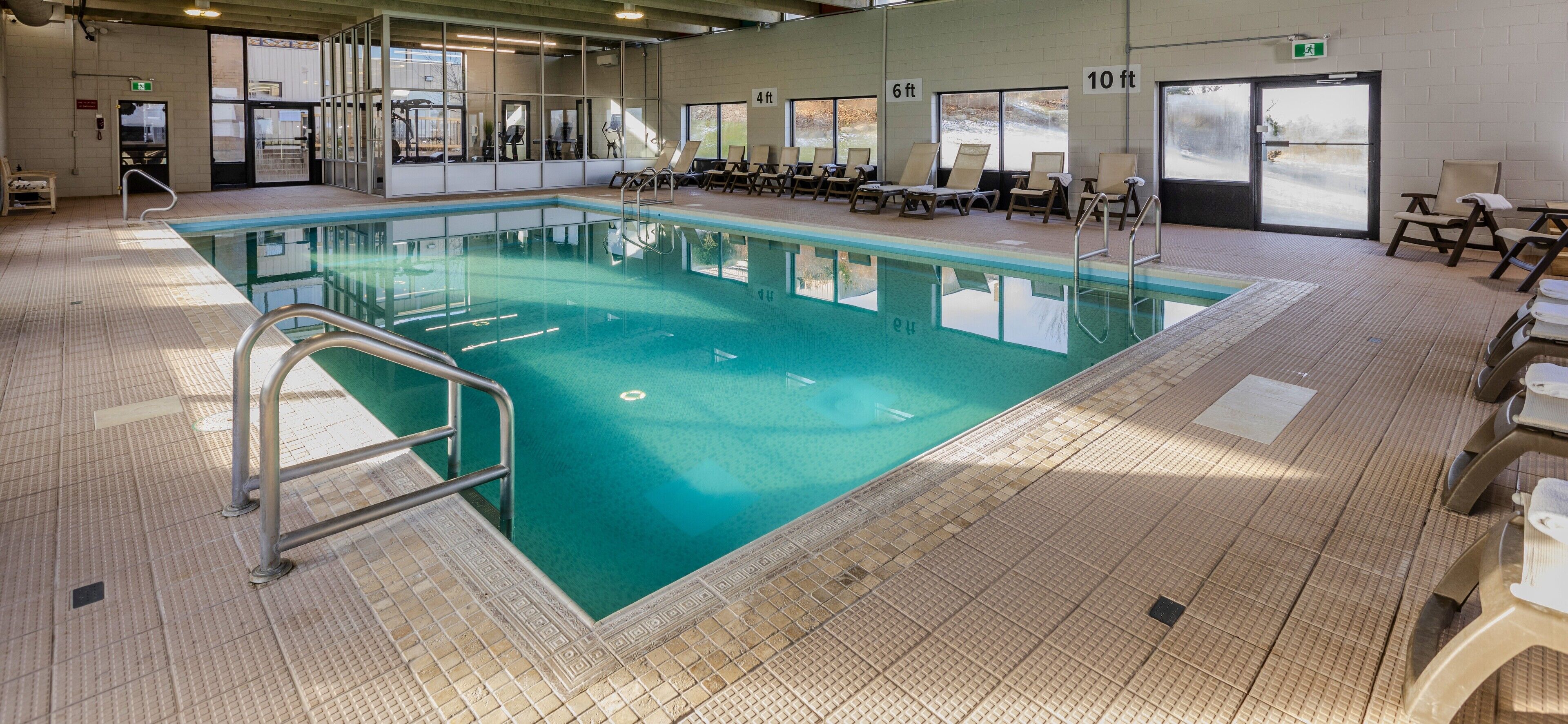 indoor pool, open 7:00 am to 10:00 pm, pool loungers