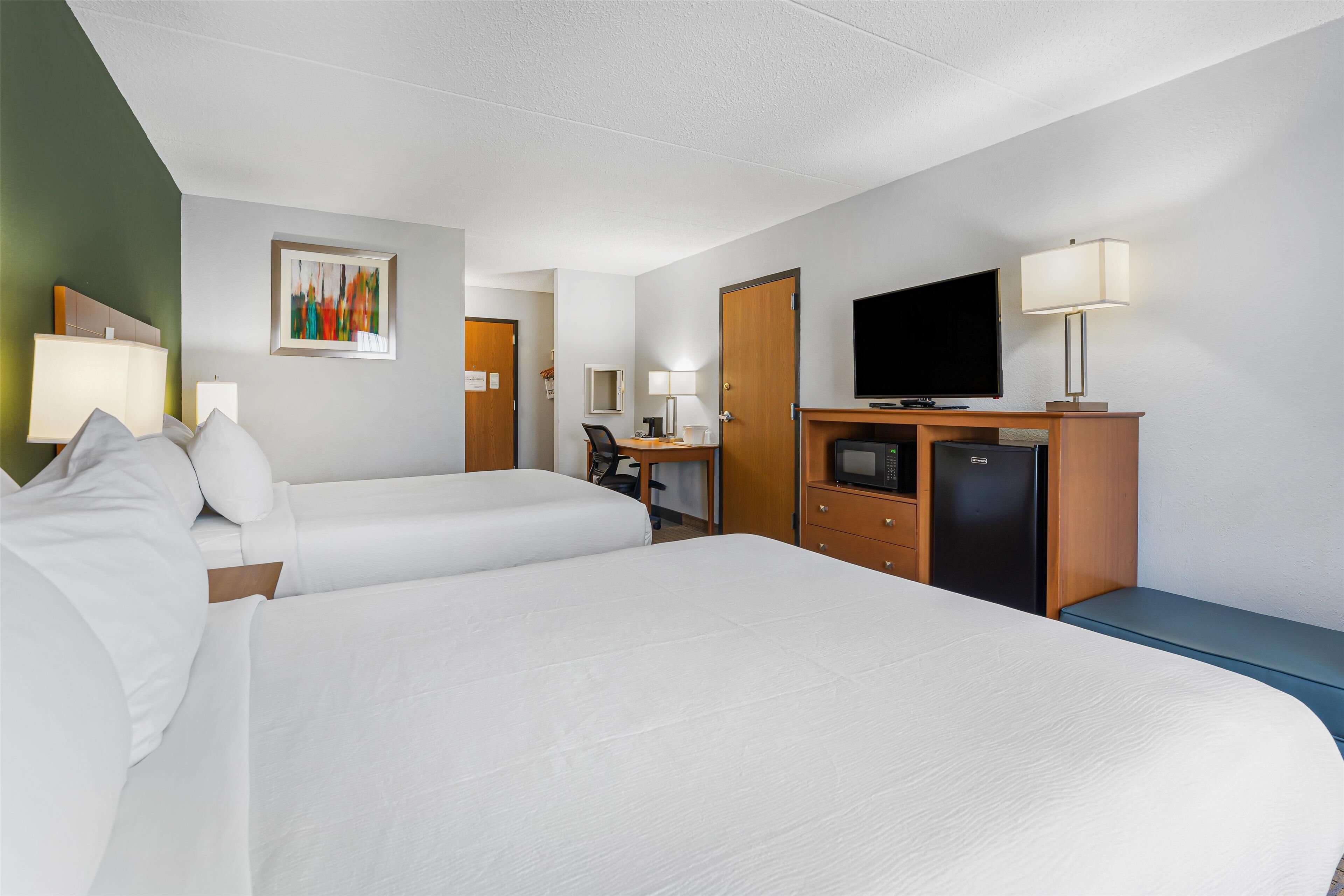 standard room, 2 queen beds, accessible, bathtub | in-room safe, individually decorated, individually furnished, desk