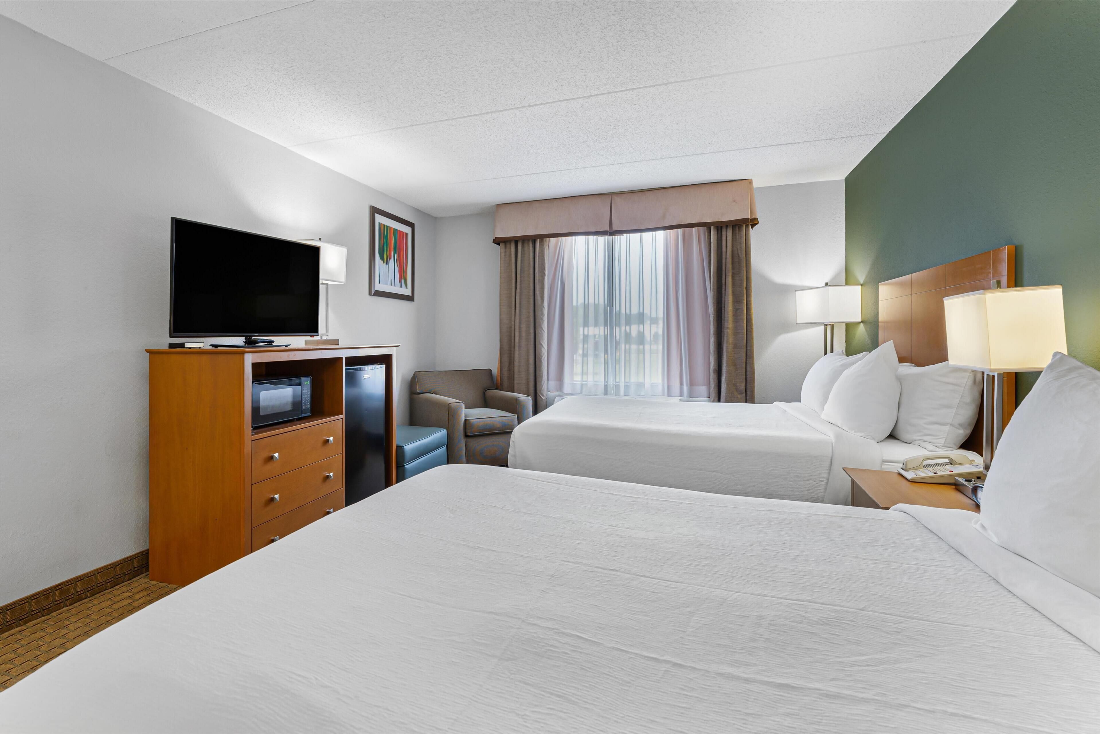 standard room, 2 queen beds, accessible, bathtub | in-room safe, individually decorated, individually furnished, desk