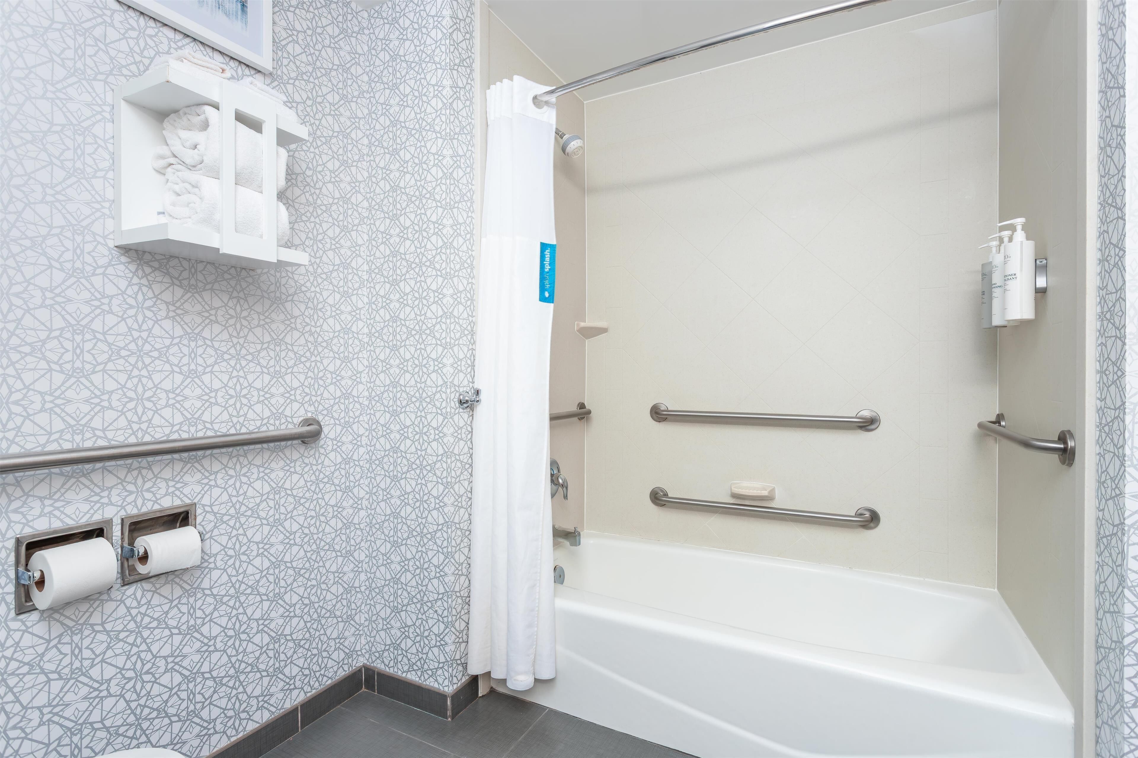 room, 1 king bed, accessible, non smoking | bathroom | designer toiletries, hair dryer, towels, soap