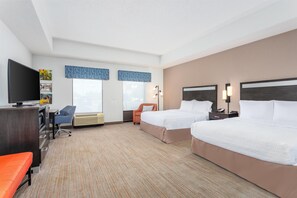 Premium bedding, laptop workspace, iron/ironing board