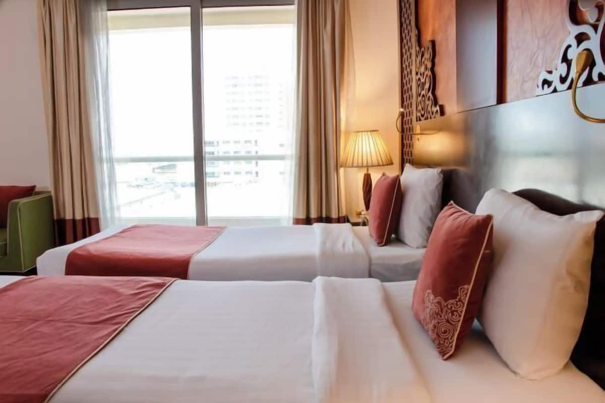Premium bedding, pillowtop beds, minibar, in-room safe