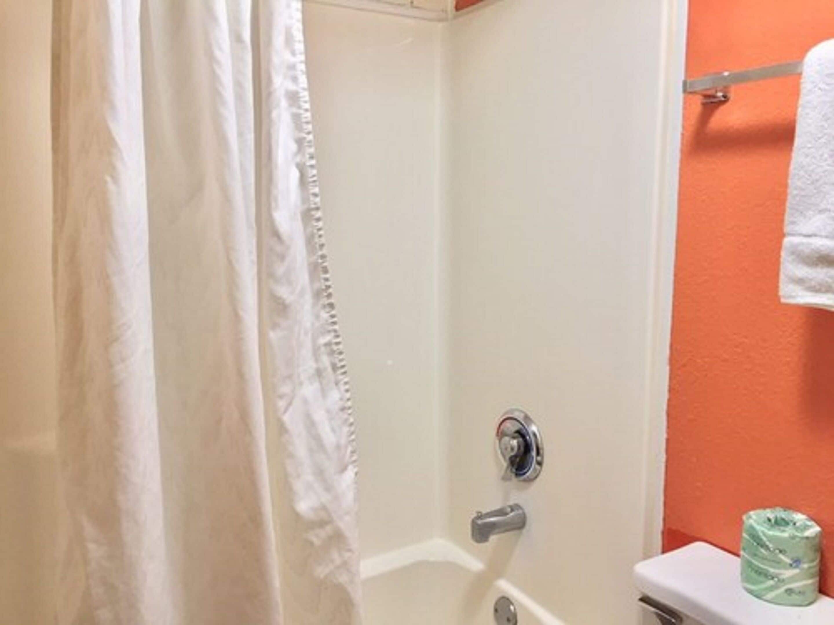 Combined shower/tub, hair dryer, towels, soap