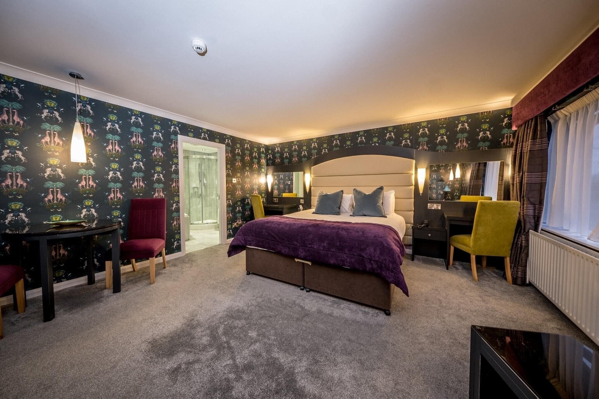 suite, 1 king bed, non smoking | in-room safe, desk, laptop workspace, rollaway beds